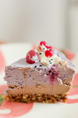 raw vegan cake with fruits and seeds