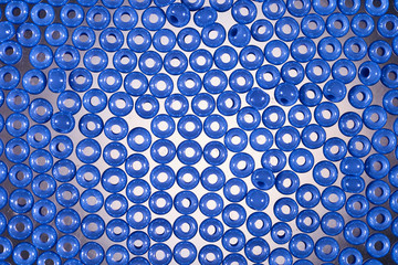 Background of glass beads for needlework. Macro shooting