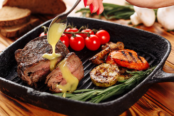 Sliced Beef Steak Sirloin Pouring Mustard Sauce
