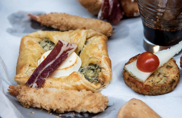 Variation of dishes with delicious traditional Spanish tapa food.