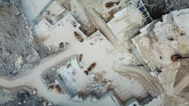 Aerial: Flying above world famous marble quarry near the city of Carrara, Tuscany, Italy