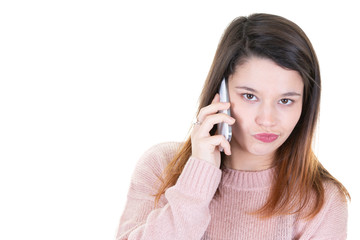 portrait of young woman with mobile phone looking down with copy space