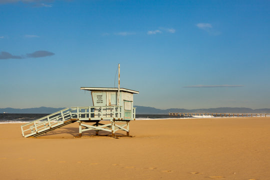 Lifeguard tower with hermosa beach pier in background Hermosa Beach California