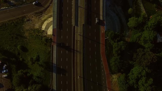 Top view of bridge with cars. Glorious footage taken by drone. Nature. Out of town. Suburb. Ukraine. Transport concept, traffic.