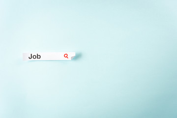 Concept of use internet to search for jobs, on blue background. Paper label like a web input form with the word 