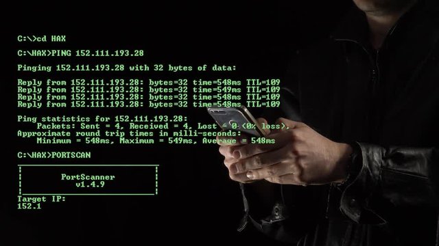 Hacking passwords with a smartphone mobile device. Green coding appearing on the screen showing the hacking process.