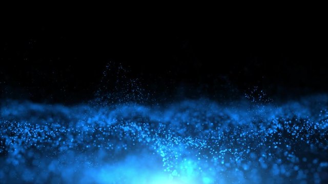 Abstract shine blue colored particles flowing on black copy space background.