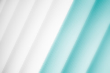 Obraz premium Elegant striped ocean turquoise background pattern fading into white space