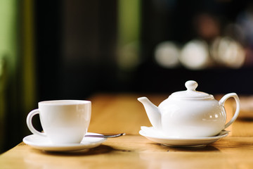 cup of tea at cafe blurred background
