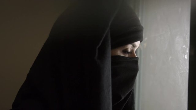 Muslim woman wearing a traditional clothing