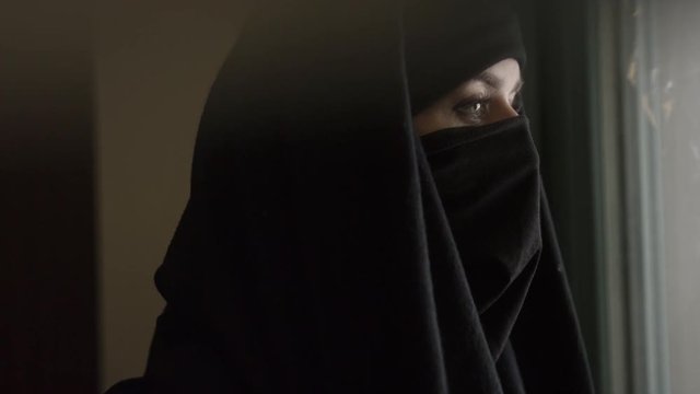 Muslim woman wearing a traditional clothing