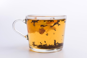 Glass cup of black tea with lemon. Isolated on white background