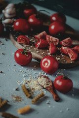cherry tomatoes on wooden board