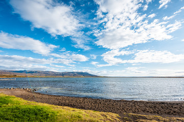 Obraz na płótnie Canvas Laugarvatn lake in south Iceland on Golden Circle shore water wide angle view of Hot Springs Geothermal area on sunny day