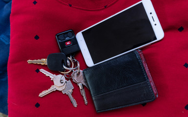 Wallet, keys and cellphone.