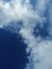 White clouds against the blue sky