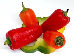 red and green peppers isolated on white background