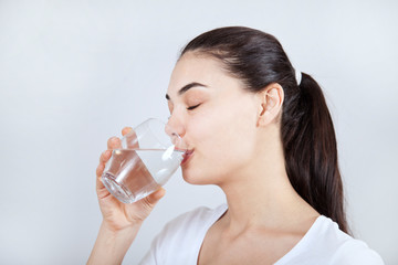 Young woman drinking water