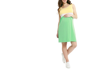 Pregnant woman in short dress isolated white background