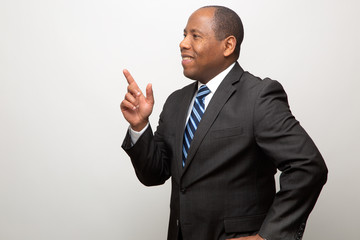 African American Business Man Smiling and Pointing