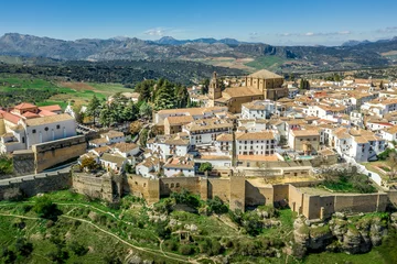 Keuken foto achterwand Ronda Puente Nuevo Ronda Spain aerial view of medieval hilltop town surrounded by walls and towers with famous bridge over gorge