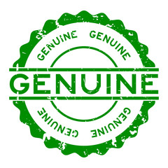 Grunge green genuine word round rubber seal stamp on white background