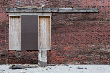 Side of abandoned red brick warehouse