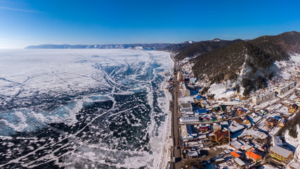 Listvyanka village on the shore of Lake Baikal, view from above in winter