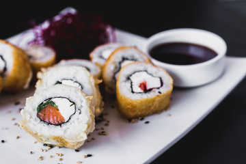 Close up Hot panko sushi roll with soy sauceauce