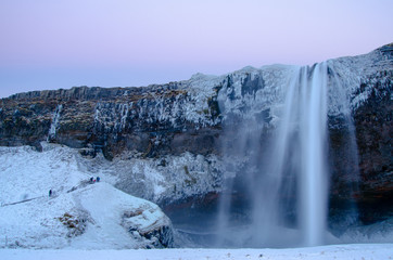 Iceland waterfall seljalandsfoss frozen in winter