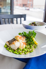 Grilled Trout with roe, pea shoots, edamame and sauce
