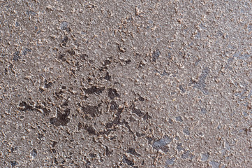The flawed coating of an old pan flakes close-up