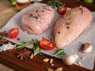 Fresh chicken breast, spices, vegetables, rosemary