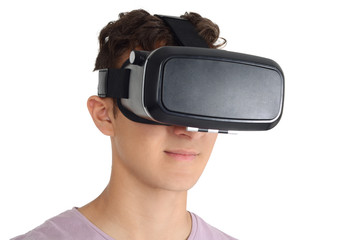 Joyful teen boy using VR goggles