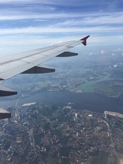 Fototapeta na wymiar Aerial view from airplane windows