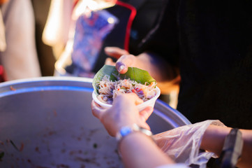 feeding the poor to help each other in society : concept of donation