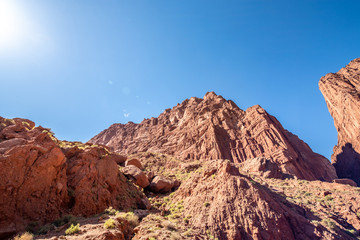 Fototapeta premium Tianshan Mysterious Grand Canyon entrance Xinjiang Uygur Zizhiqu China ，Sandstone formations in Utah USA 