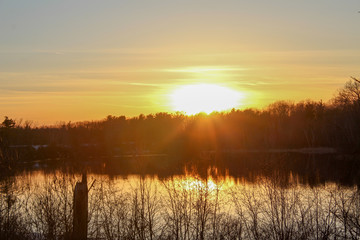 Obraz premium sunset over the lake