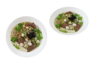 Boiled pork blood soup with flavoring herbs, Popular food can be eaten anytime. Speaking Thailand "Tom Luad Muu" Isolated on white background with clipping path.