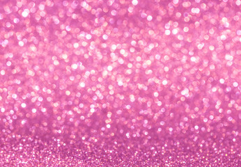 Bokeh and paper that glistens pink.