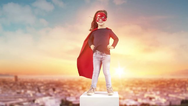 Brave superhero child looking at the landscape