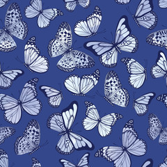 Vintage seamless pattern with watercolor butterflies on blue background