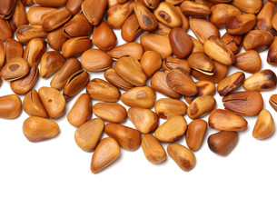 Pine nuts on white background