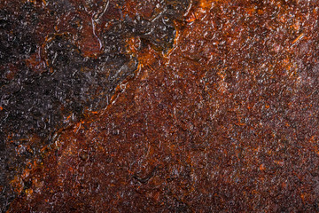 wet rusty sheet metal. old background