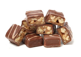 Chocolate peanut candy on white background