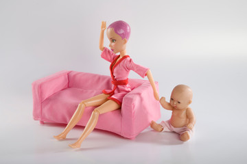 woman sits with her child, postpartum depression