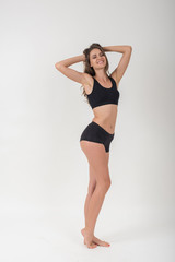Obraz premium Beautiful woman with healthy body on white background