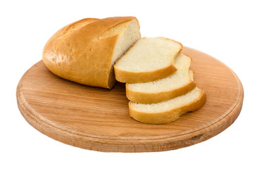 long loaf on a wooden board on a white background