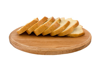 long loaf on a wooden board on a white background