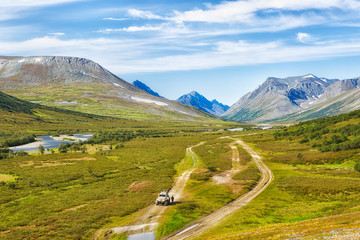 All-terrain vehicle rides on the road in the tundra, Yamal, Russia © Shchipkova Elena